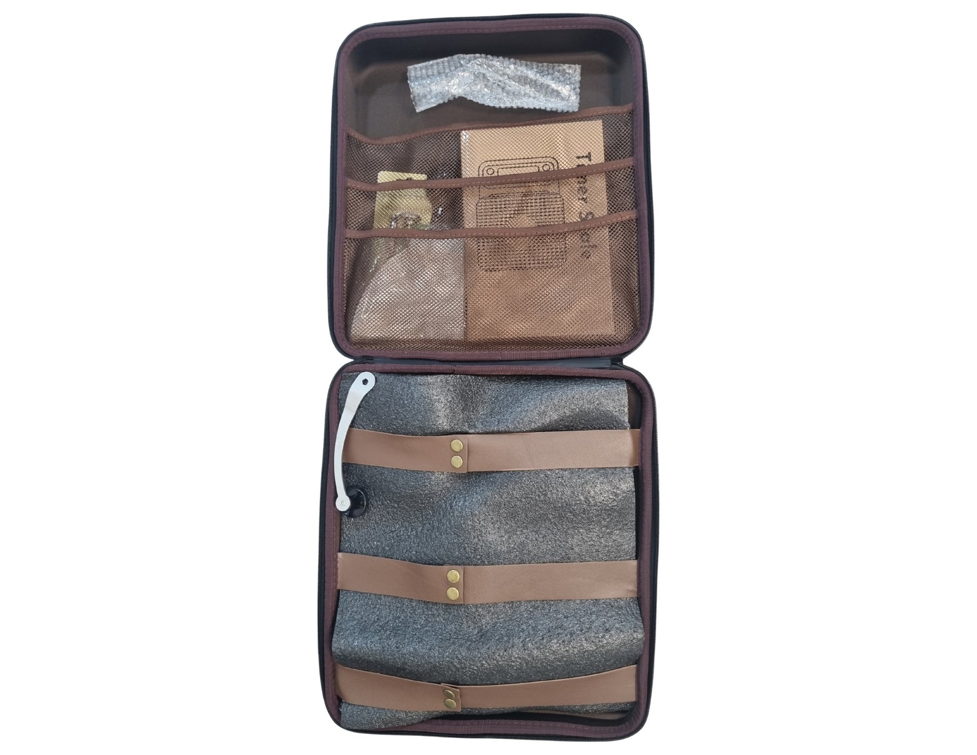 Open travel organizer with compartments on a white background