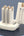 White and beige wst charging station on a gray background