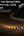 Coiled spring cable with text on a dark background