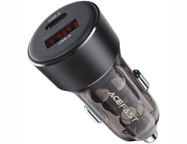 Black car charger with USB ports on a white background