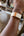 WHOOP SuperKnit Luxe Bands – Onyx with Gold & Sand Dune