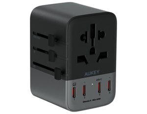 AUKEY travel adapter with multiple ports on a white background