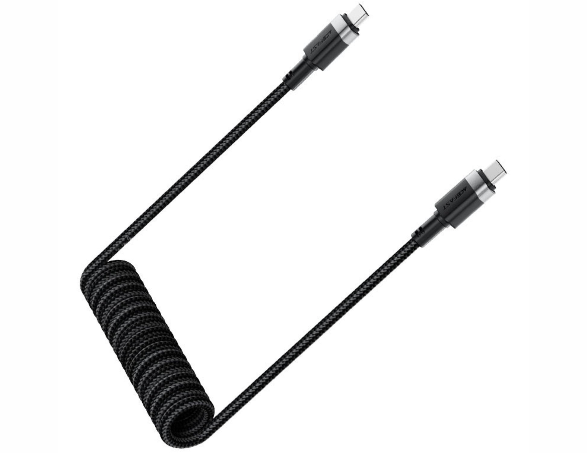 Coiled black cable with multiple connectors on a white background