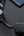 Black USB-C cable with a round connector on a dark surface