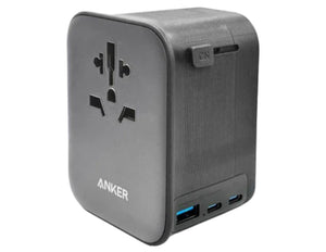 Anker travel adapter with multiple ports on a white background
