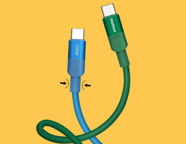 Green and blue charging cable with 'momox' branding on a yellow background