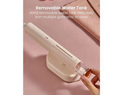 Moxedo 2-in-1 Dynamic Steam Flat Iron MX-DF1011 with detachable water tank on a pink fabric background