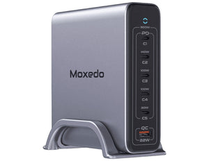 A black Moxedo Volton II PD GaN 300W Desktop Charger with multiple ports and a detachable metal base.