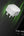 White adapter device with green light effects on a black background