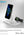 Multifunctional charging stand with phone, watch, and headphones on a gray background
