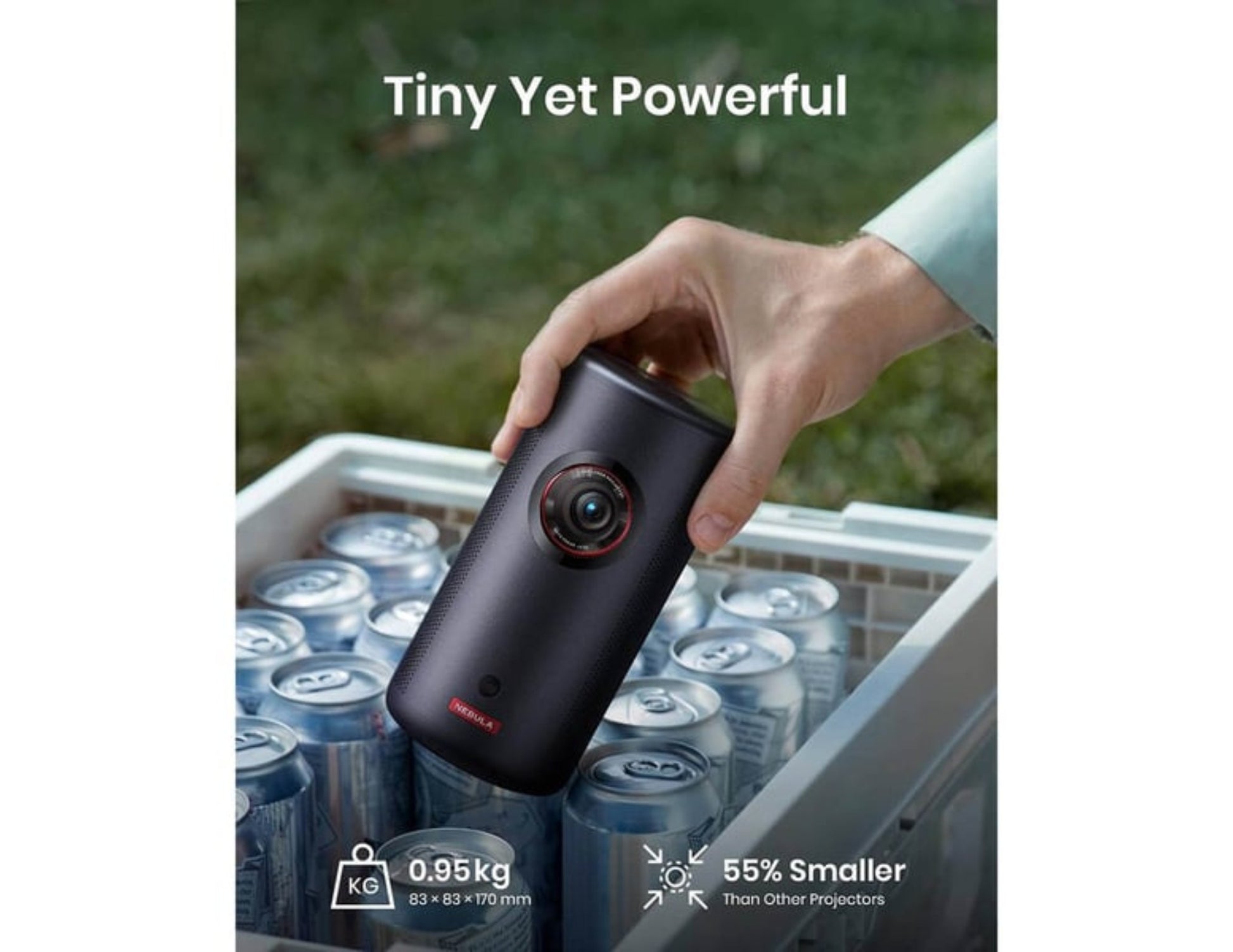 Hand holding a small projector over a crate of cans with text 'Tiny Yet Powerful' and specifications.
