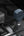 Momax 1-Move⁺ 2-Port Car Charger With Built-In Retractable Cable 60W (UC19E) on a car dashboard, featuring the brand 'momax'.