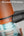 Close-up of a vacuum cleaner's filtration system with four layers highlighted.