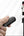 Hand holding a black smartphone gimbal with a phone displaying a photo on a white background