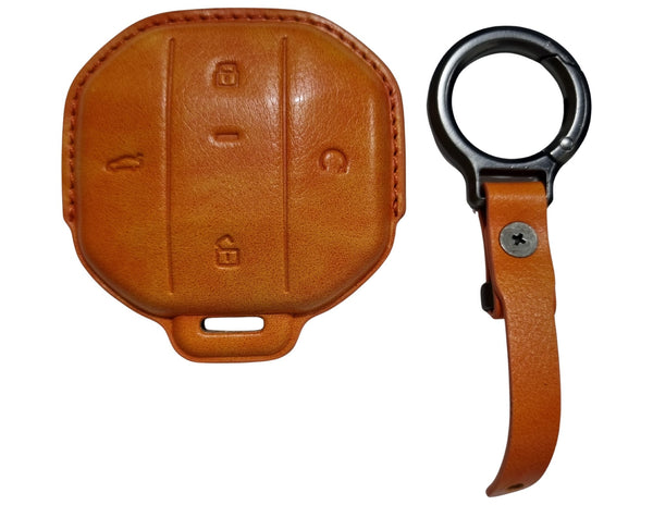 Brown Jetour Hybrid Car Key Cover – Alcantara / Leather Finish with a matching keychain on a white background