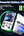 Handheld gaming console with battery pack and charging information on a dark background
