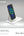 Phone on a charging stand with 'momax' branding on a gray background