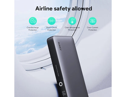 Aukey PB-Y43P Sprint X 130W PD 20K mAh Fast Charging Power Bank with safety features displayed against an airplane window background