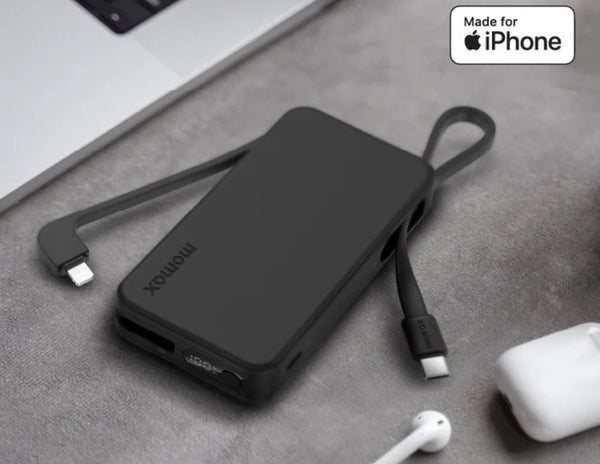 Black power bank with USB-C cable on a gray surface, featuring 'Made for iPhone' label.