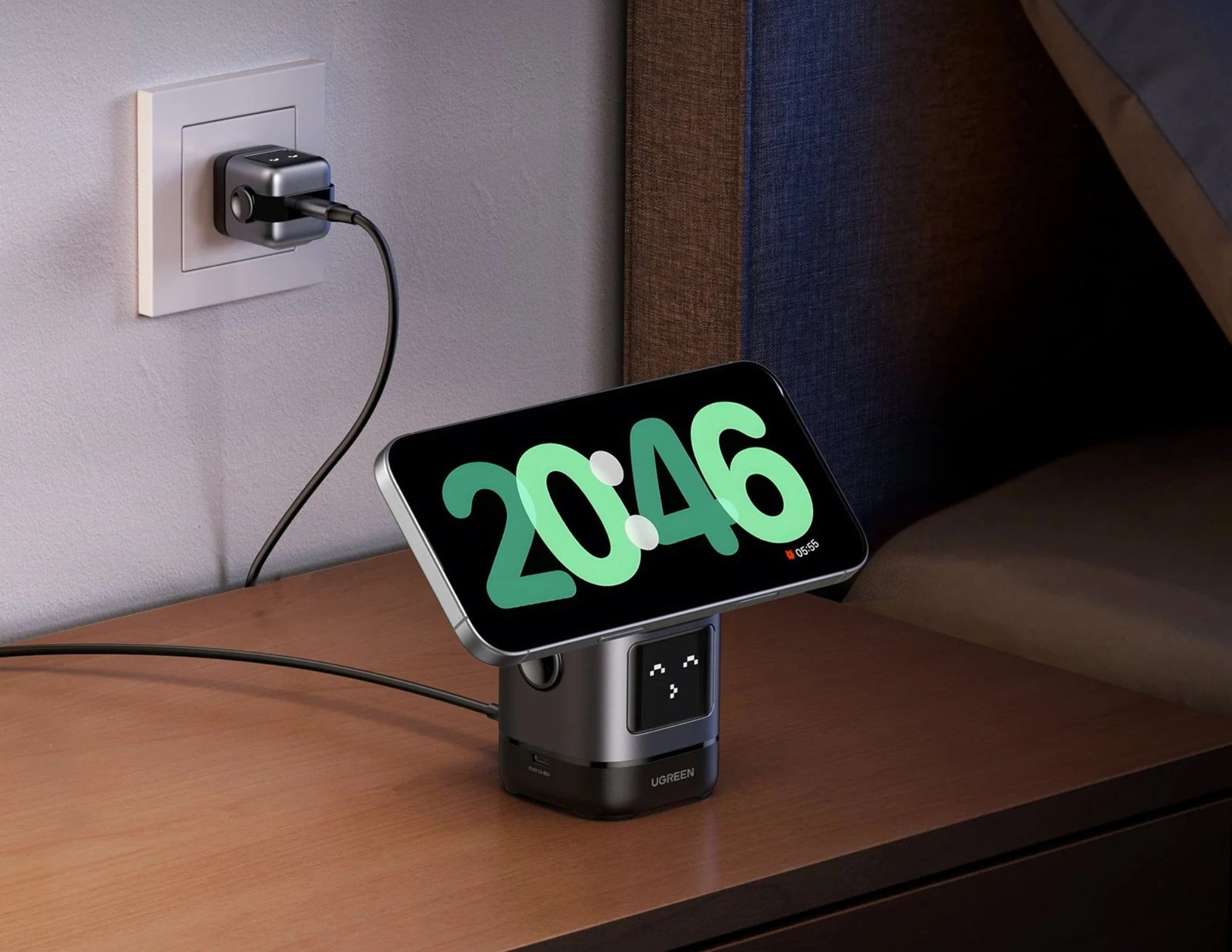 Digital clock displaying the time on a UGREEN Uno 2-in-1 Magnetic Wireless Charging Station – W709 next to an electrical outlet.