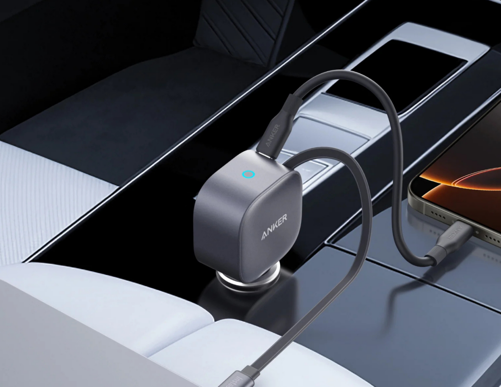 Anker Nano 75W Car Charger A2738HA1 charging a laptop and tablet simultaneously with its dual-device ports.