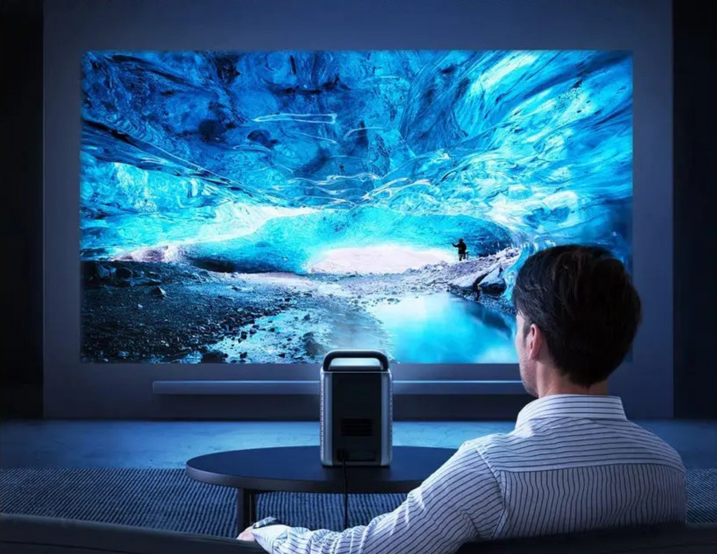 Anker Nebula Cosmos Laser 4K Projector displaying a vivid 4K movie on a large screen.