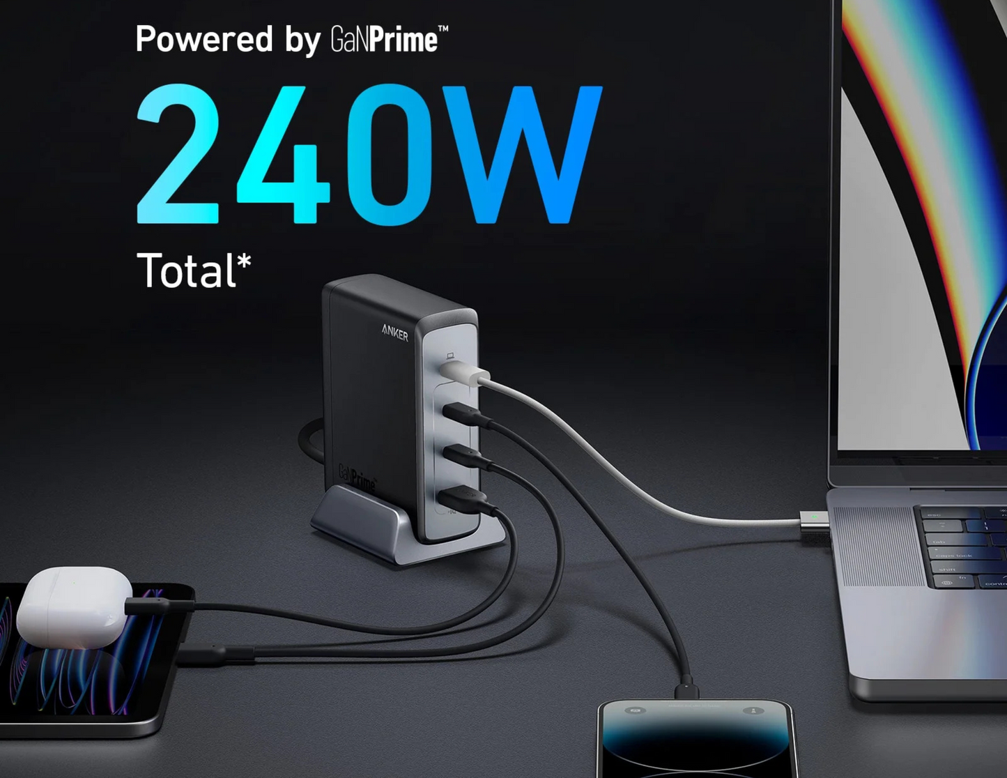 Anker Prime 240W GaN Charger A2342211 charging a MacBook and iPhone.