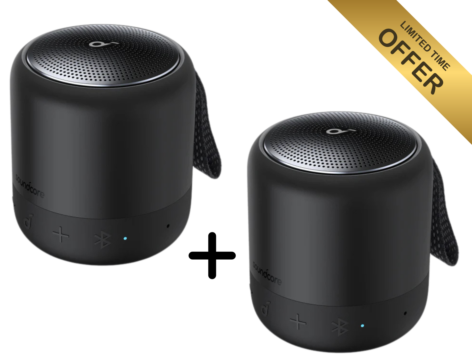 Pair of Anker Soundcore Mini 3 speakers on a wooden table, showcasing their compact design