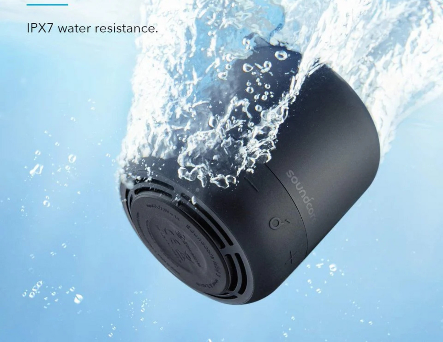 Anker Soundcore Mini 3 speakers in a poolside setting, emphasizing their waterproof feature