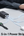 Baseus GaN5 Pro Power Strip neatly organized on a desk for efficient charging