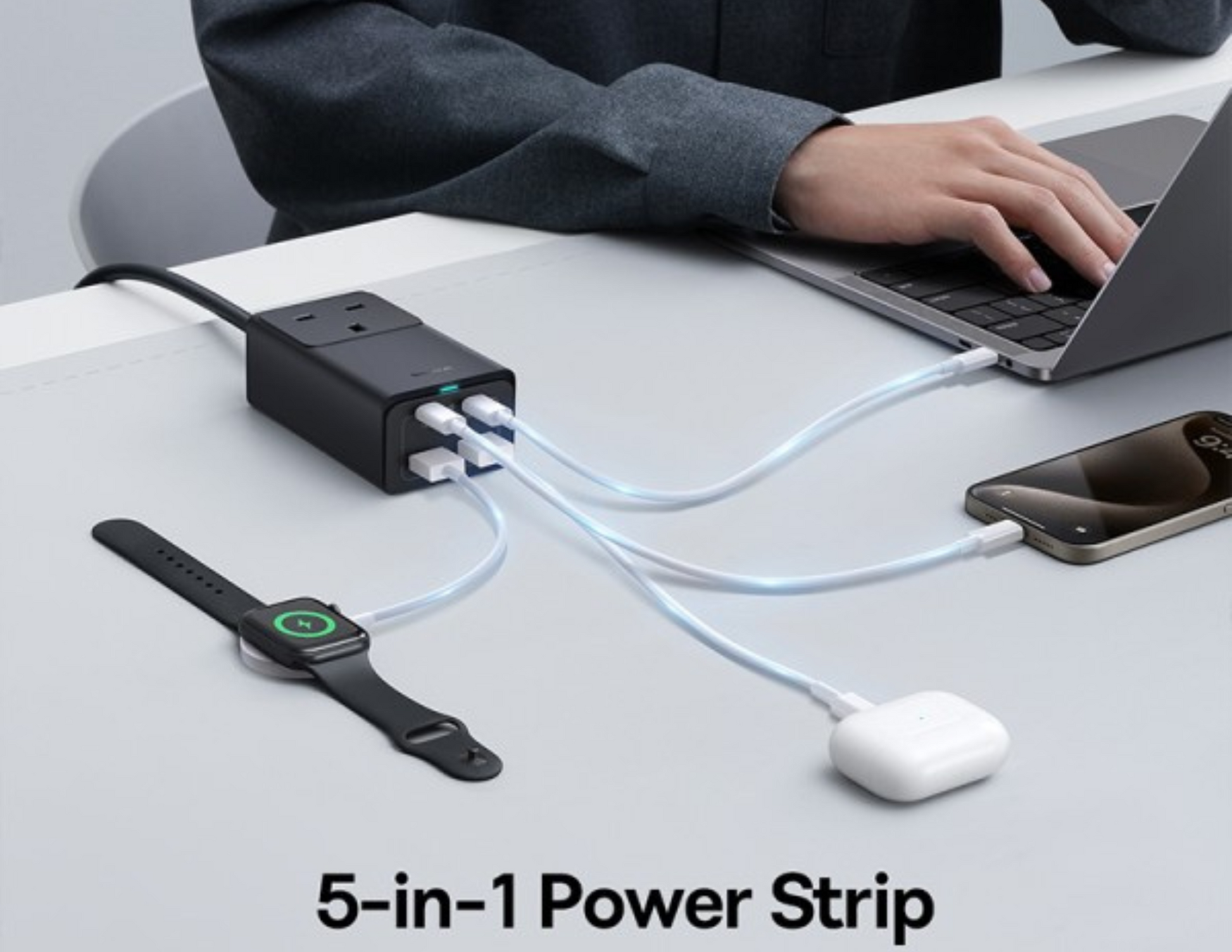 Baseus GaN5 Pro Power Strip neatly organized on a desk for efficient charging