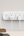 Mounted Belkin Surge Protector SRB003af2M on a wall with organized cables.