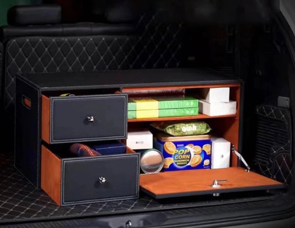 Black car trunk storage box placed inside a vehicle, demonstrating space efficiency.