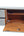 Spacious interior of the car trunk storage box white with adjustable compartments and drawers.
