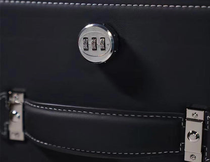 Close-up of the alloy combination pass code lock on the car trunk organizer for secure storage.