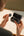 DJI Mic Mini wireless microphone kit with two transmitters, one receiver, and charging case for content creation in Qatar