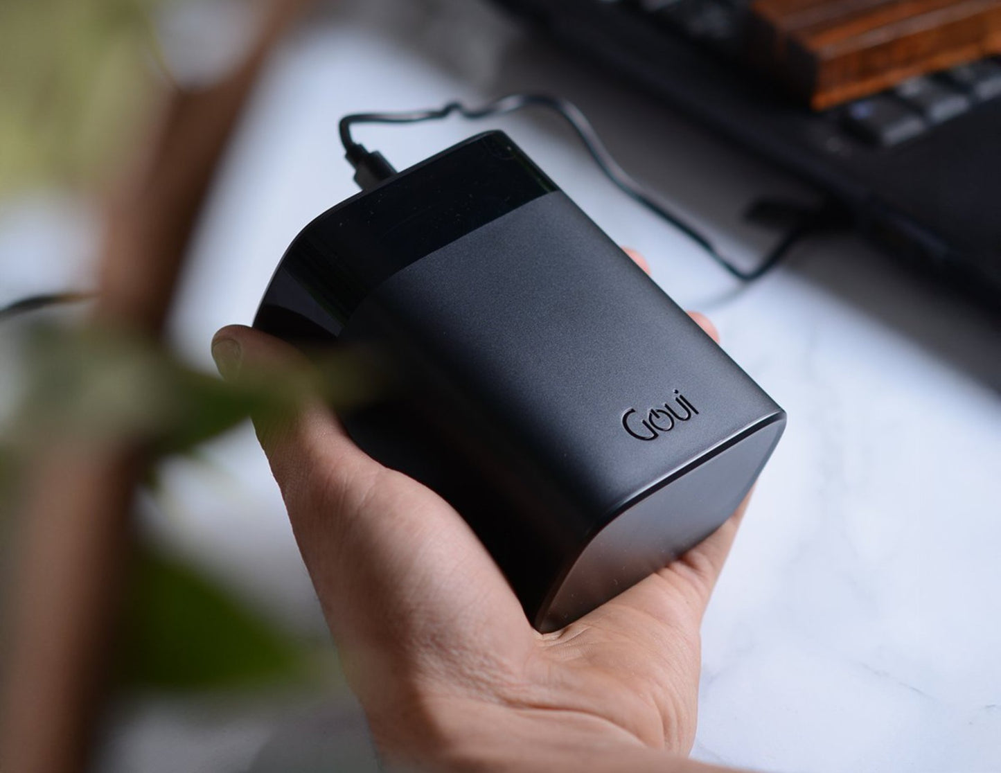 Goui P30 premium power bank 30000mAh black with 140W fast charging and multiple ports.