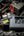 Green Lion JX-84 12V jump starter grey with air compressor flashlight and power bank.