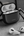 Close-up of the detachable carabiner on MagEasy Roam AirPods 4 Case.