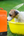 Outdoor shower being used to clean a pet with gentle water flow.