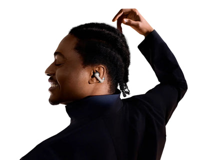 Shokz OpenDots ONE open-ear true wireless earbuds with Dolby Audio and clip-on design.