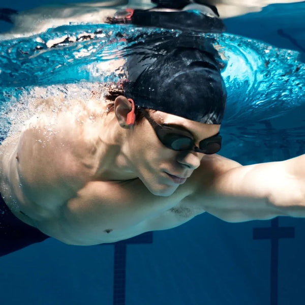 Shokz OpenSwim Pro Red swim-ready bone conduction headphones with IP68 waterproofing and 32GB MP3 storage Qatar