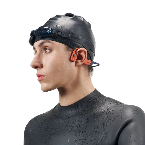 Shokz OpenSwim Pro Red swim-ready bone conduction headphones with IP68 waterproofing and 32GB MP3 storage Qatar
