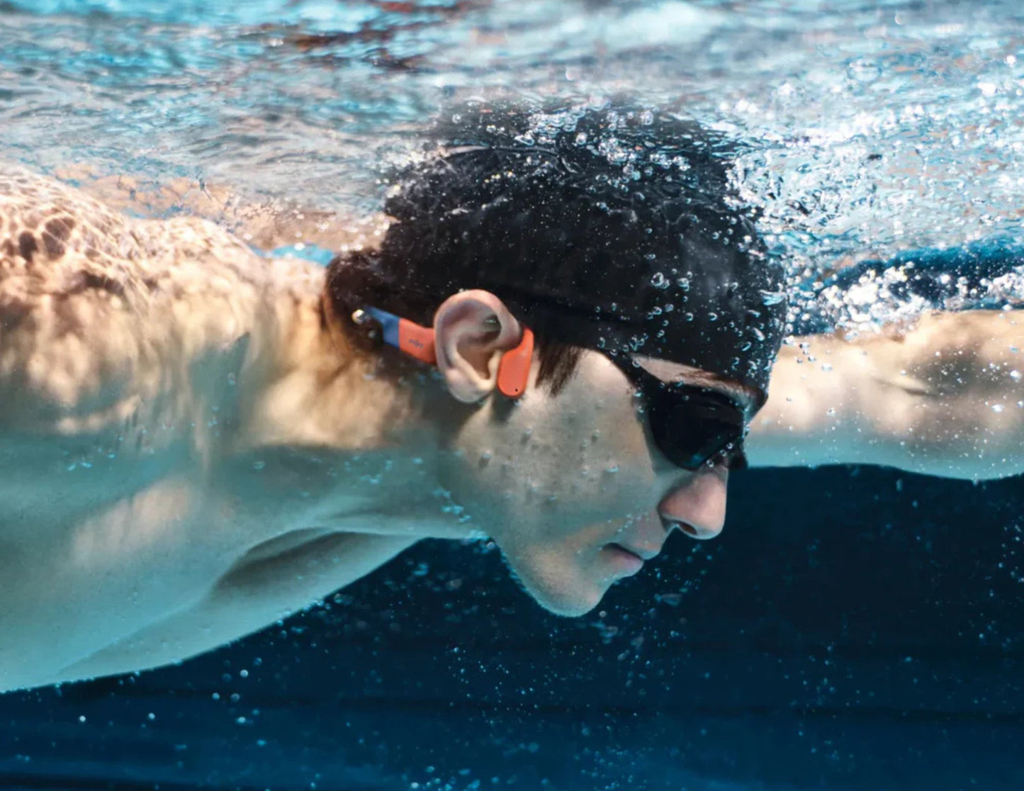 Shokz OpenSwim Pro bone conduction sport headphones with IP68 waterproof rating and open-ear design.