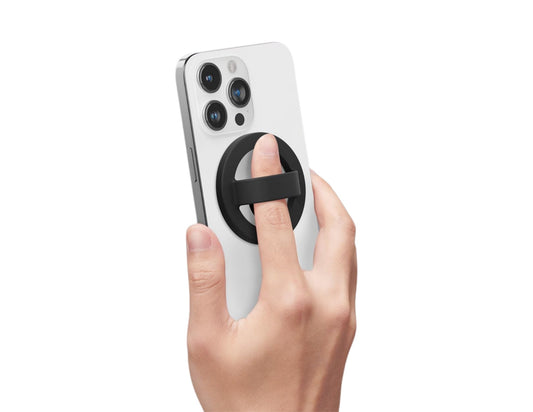 Black silicone magnetic 360-degree phone ring grip holder attached to smartphone Qatar