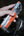 Skinarma PHAZE ARCH XE magnetic 2 in 1 grip stand orange phone accessory Qatar