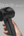 Close-up of the Turbo Fan X Mini 64's control buttons and grip.