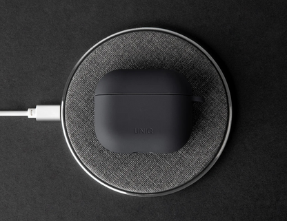 Uniq Nexo case on AirPods (4th Gen) with wireless charging functionality.